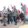 Marcher_with_dogs___drum-thumb